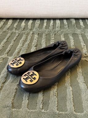 Tory Burch Black Leather Logo Ballet Flats with Gold Emblem